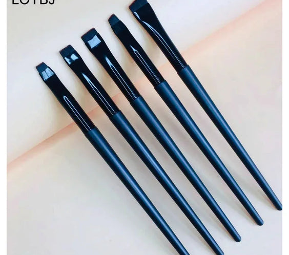 Thin angled eyebrow brush with yellow wool fiber bristles flat angled tip wood handle aluminum ferrule 14.0-14.5cm