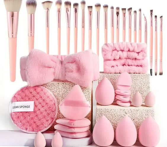 20pc Pink Wool Fiber Brush Set 20 pink brushes with wool fiber bristles and one pink beauty blender sponge plastic handles