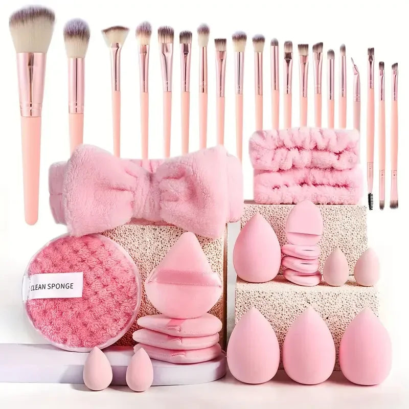 20pc Pink Wool Fiber Brush Set 20 pink brushes with wool fiber bristles and one pink beauty blender sponge plastic handles